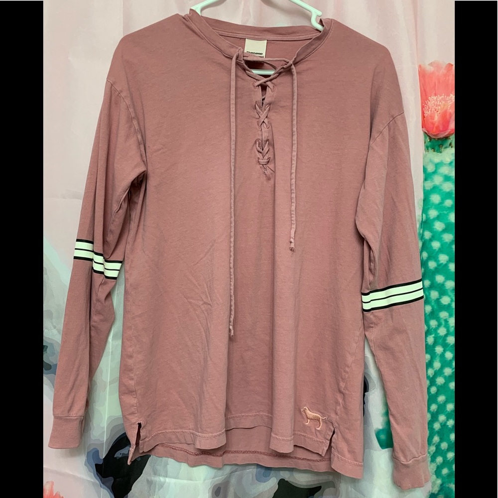 Mauve lace up long sleeve shirt.